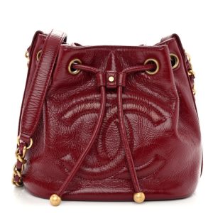 Chanel Shiny Aged Calfskin CC Chain Mini Drawstring Bag Red